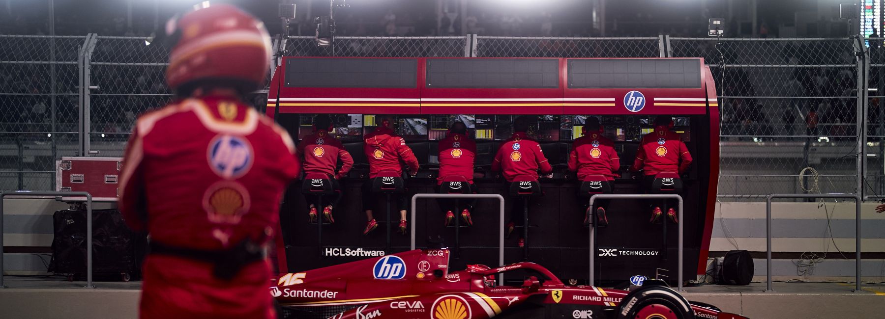 Driver and crew prepare for race - Leading the future of driving in a human-machine world | DXC Technology Insights