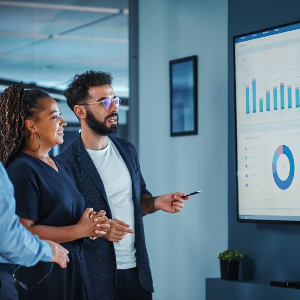 Business professionals analyzing Enterprise Scale-Out Roadmap | DXC Technology
