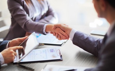 Business people shaking hands, finishing up a meeting