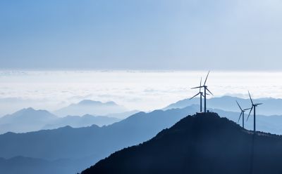 Solar and wind energy systems representing energy software solutions for managing and optimizing renewable resources | DXC Technology