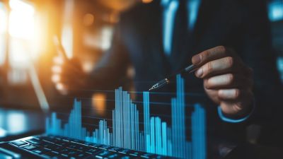 Businessman planning investments representing Assure Life+, Life & Annuity | DXC