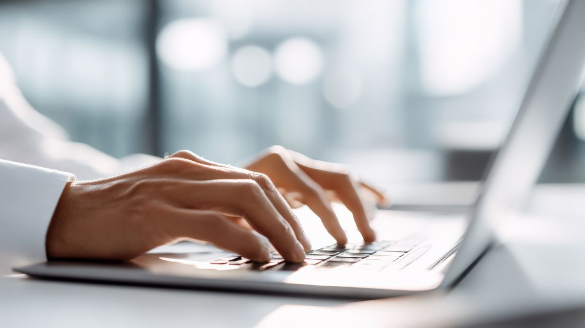 Professional completing a T+1 readiness assessment on a laptop