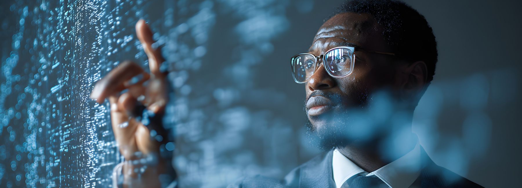 Business professional interacting with a digital data interface illustrating financial services cybersecurity and AI-powered threat detection.