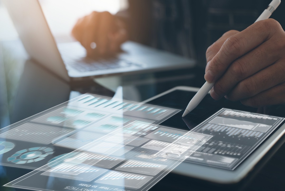 Business man busy working on laptop representing Enterprise Financial Risk Management Advisory and Consulting | DXC Technology | DXC Technology