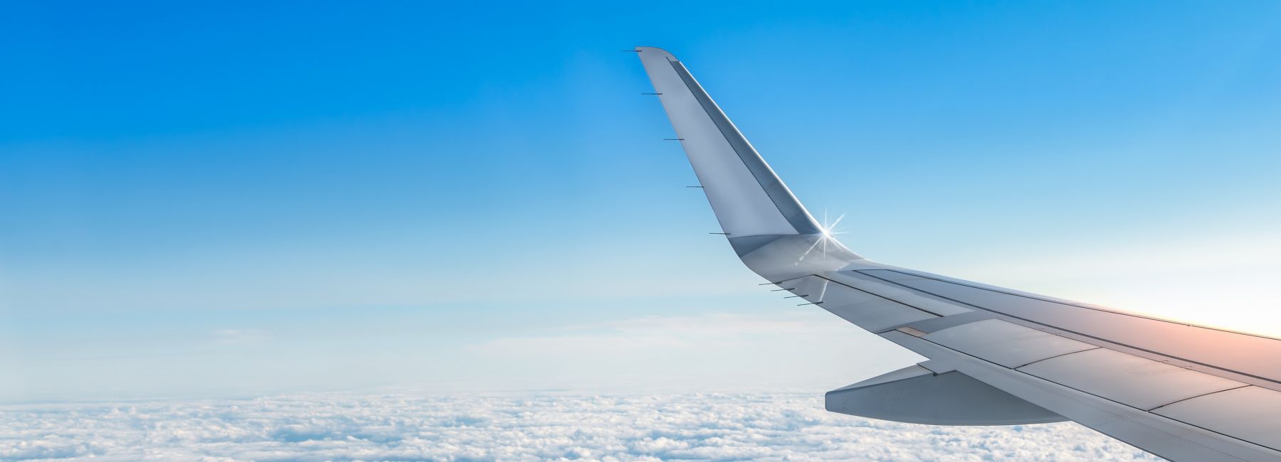 Glowing city skyline with network lines symbolizing seamless zero trust integration and protection, Zero trust solutions | DXC Technology