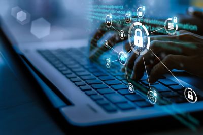 Laptop with lock overlay symbolizing identity governance, access control, and compliance management, Zero trust solutions | DXC Technology