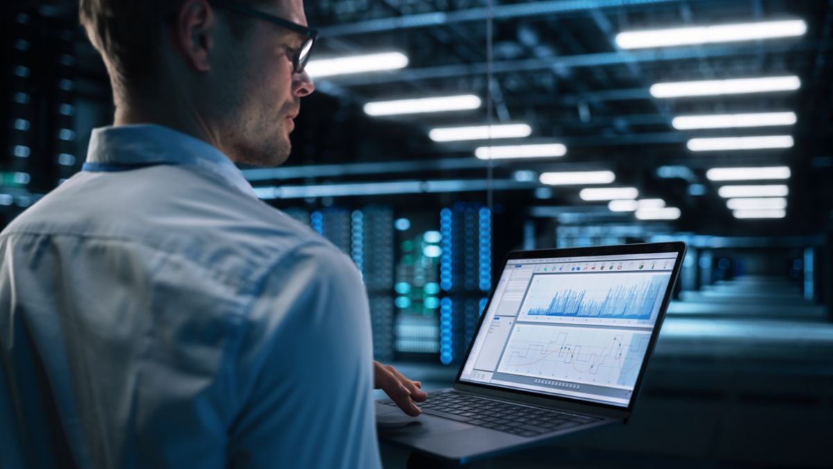 Business professional analyzing E/CTRM integration services and solutions | DXC Technology