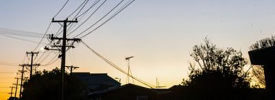 Power lines in a neighborhood, Compute & Data Center | DXC Technology Customer Story