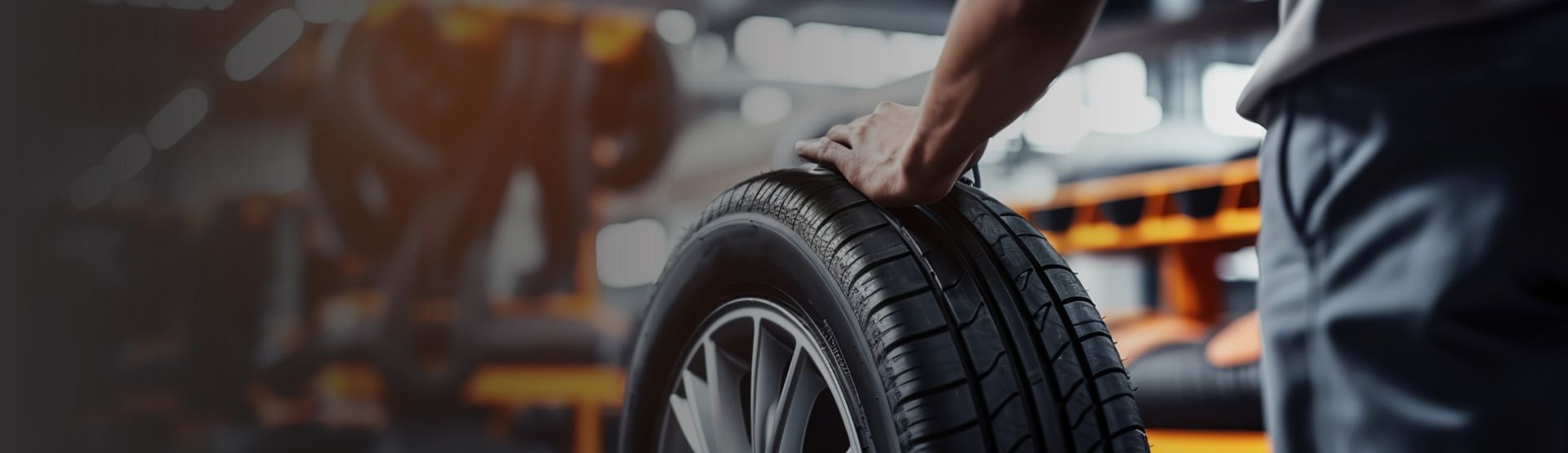 Tech replaces winter tires, representing Bridgestone employees | DXC Customer Stories