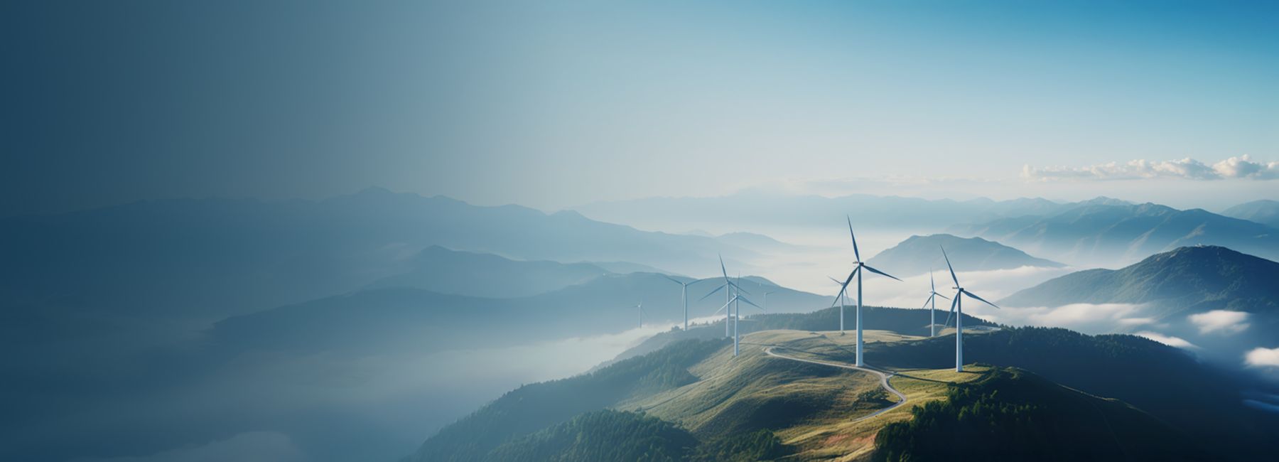 Wind turbines generating renewable energy, representing IT services for the energy sector | DXC Technology