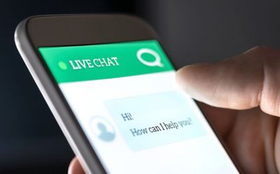 smartphone with live chat on screen