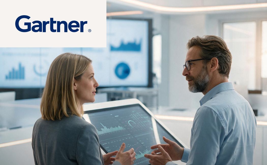 Leaders reviewing digital employee experience and workplace management insights