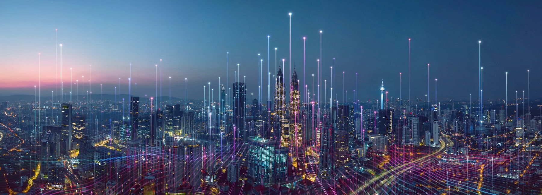 Cityscape at night - Empowering Customers in the Era of AI | DXC Technology Insights