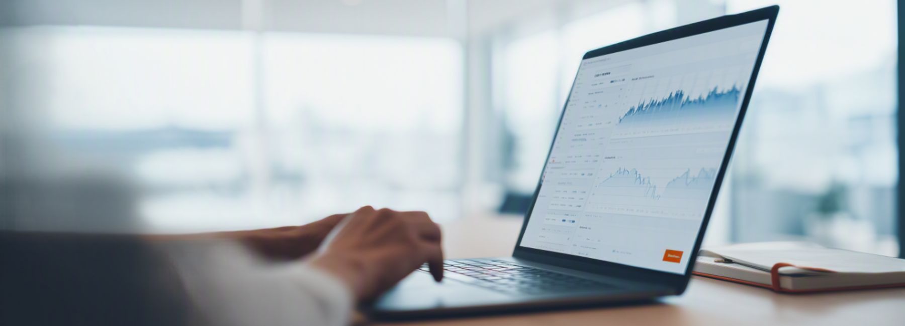 Business professional analyzing trading data for E/CTRM integration services delivered through the DXC and interop.io partnership.