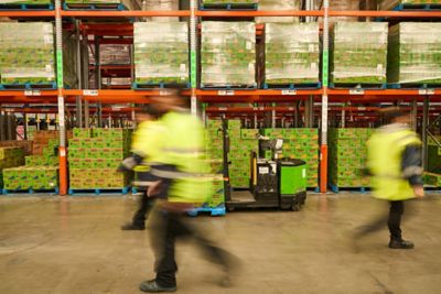 Workers in a warehouse | DXC Technology customer story