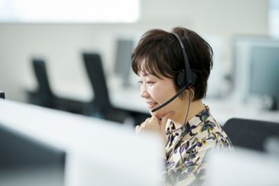 Asian female on headset