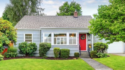 cute gray house with red door