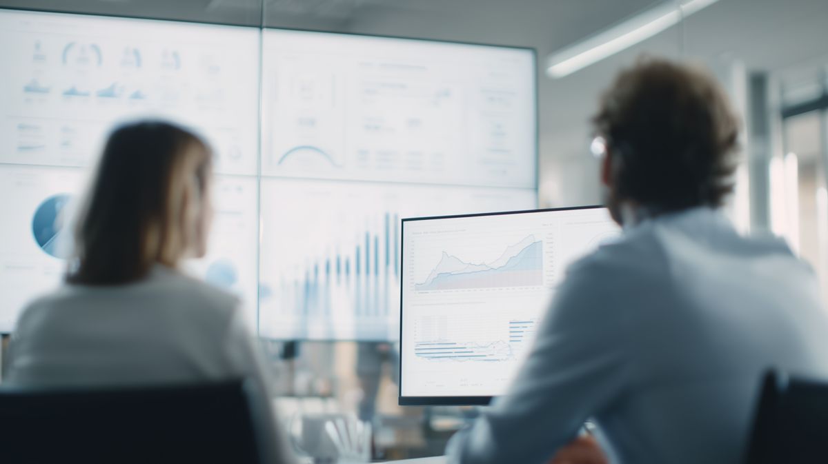 Professionals analyzing data to improve customer engagement and drive business growth with a cloud contact center platform | DXC Technology