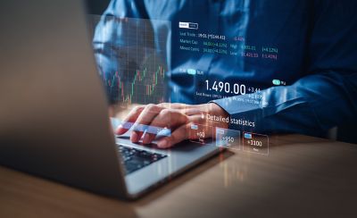 Analyst analyzing financial data., Wealth Management and Private Banking, Financial Services | DXC Technology
