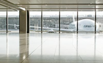 Glass doors of office building, representing transformation in Insurance industry | DXC Technology