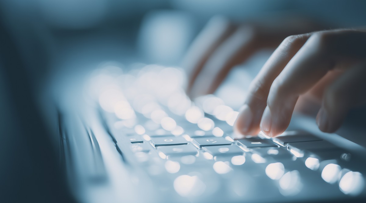 Technical operator works in the system control room, Hogan’s API & Microservices solution | DXC Technology