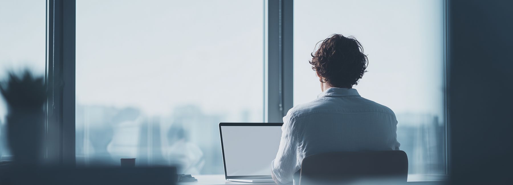 Glowing city skyline with network lines symbolizing seamless zero trust integration and protection, Zero trust solutions | DXC Technology