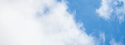 White clouds in blue sky, Aerospace & Defense | DXC Technology Insights