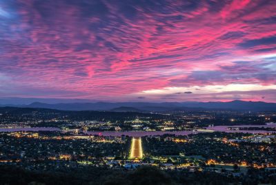 Nighttime view of cityscape, Traditional Hosting | DXC Technology  Customer Story