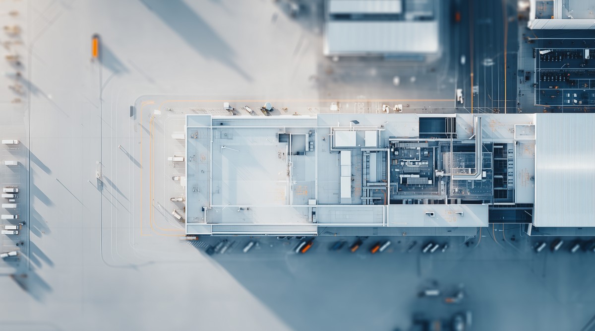 Customer story banner, aerial view of buildings and streetscape | DXC Technology Customer Stories 