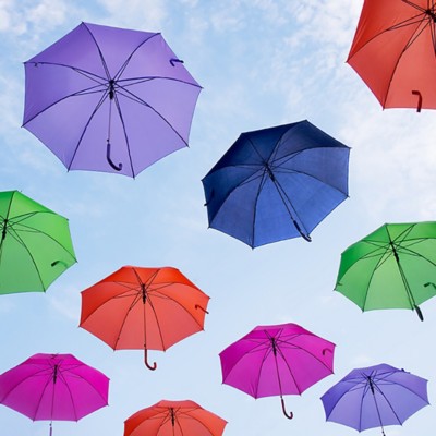 colorful umbrellas against blue sky
