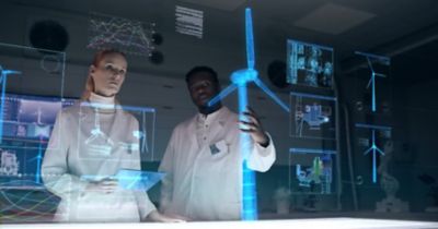 workers using virtual reality in lab | DXC Technology