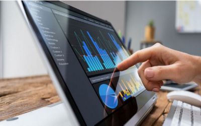 finger pointing to charts on laptop screen, Storage & Backup | DXC Technology