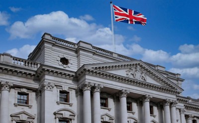 UK Government building flying the Union Jack- Example of Successful Digital Transformation in Healthcare | DXC Customer Story