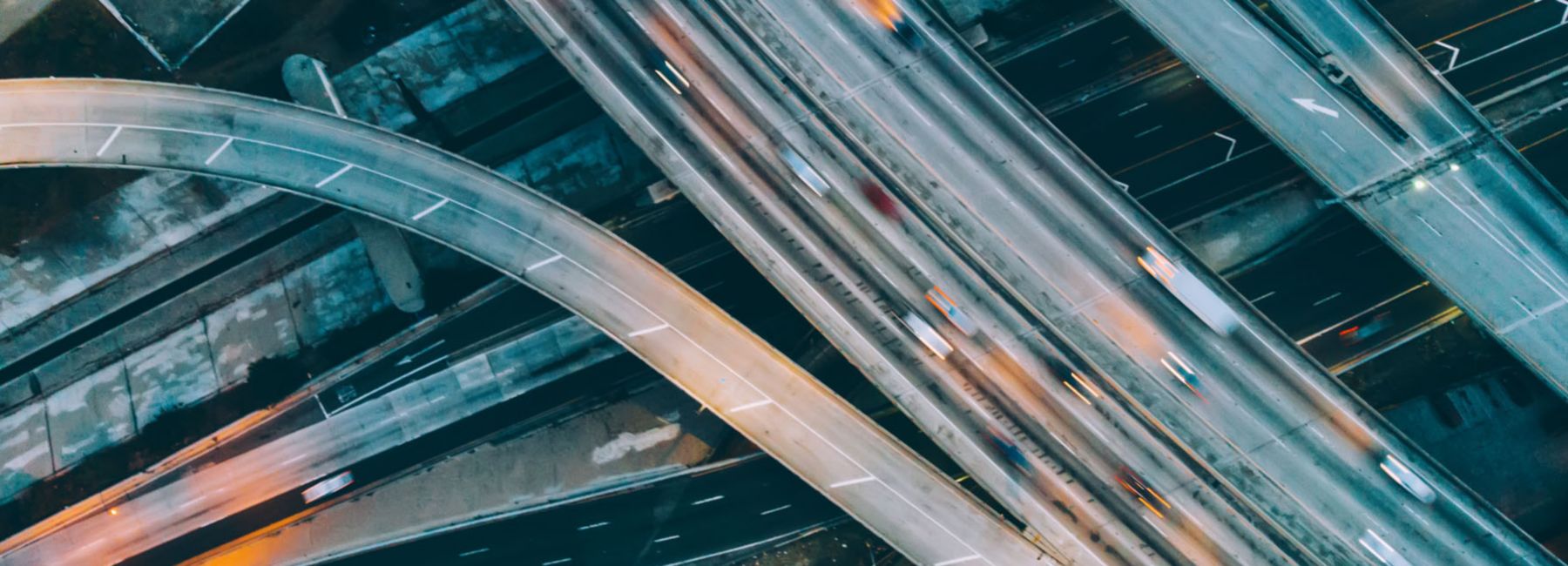 Vehicles traveling on intersecting highways - VMware licensing changes and the road ahead | DXC Technology Insights