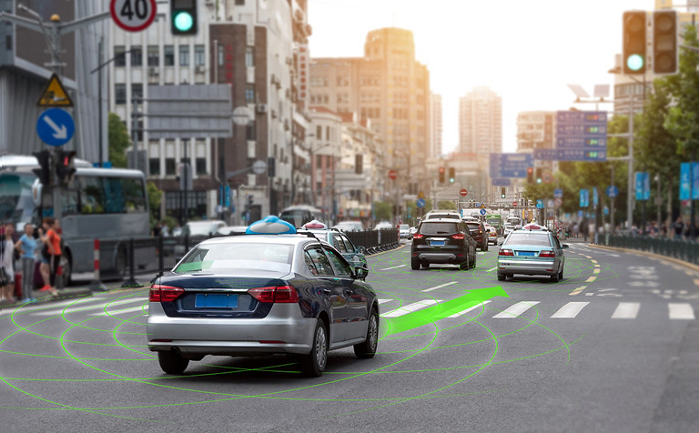 cars on city street that has green sensor arrow overlay