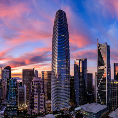 looking up at buildings and clouds