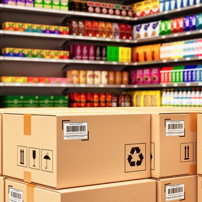 Distribution warehouse logistics, packaged parcels ready for shipment and delivery, stack of cardboard boxes in a retail store on the background of shelves with goods,Distribution warehouse logistics, packaged parcels ready for shi